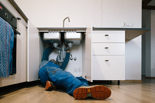 Professional Drain Cleaning technician working in Plains, KS